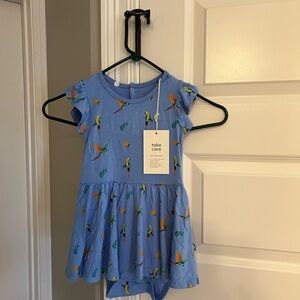 Kyte BABY NWT twirl bodysuit in macaw, size 4T